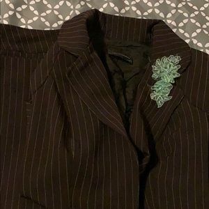 Brown suit with mint green stripe detail